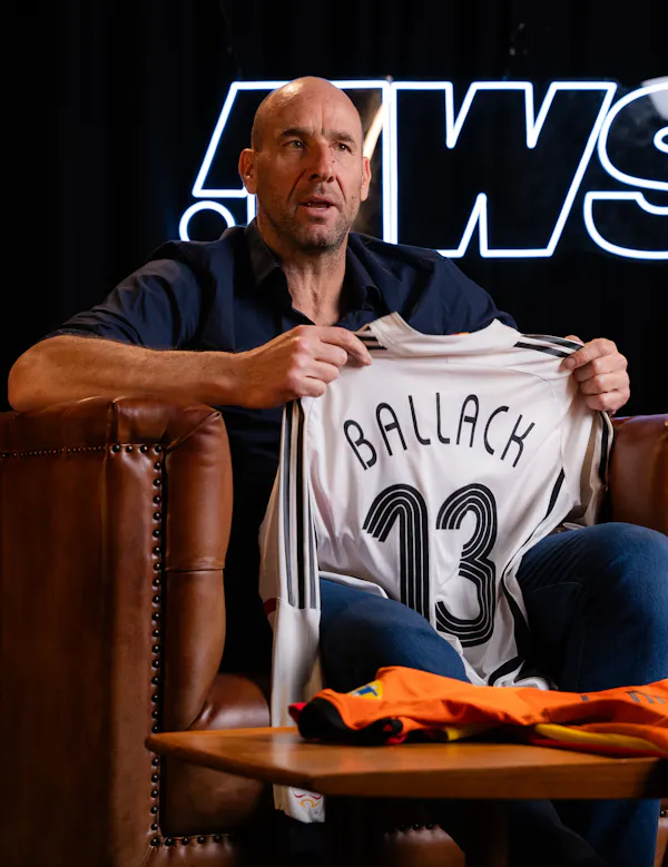 Jan Koller holding Michael Ballack Germany shirt